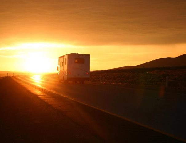 RV On the Road at Sunset